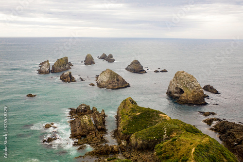 View to the rocks in the Pacific ocean on Nugget Point. It is located in the Catlins area, Otago region, South Island, New Zealand.