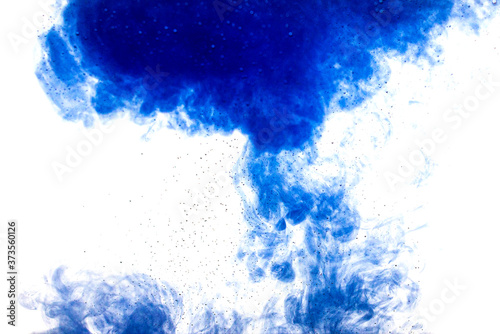 A cloud of blue paint released into clear water. Isolate on a white background.