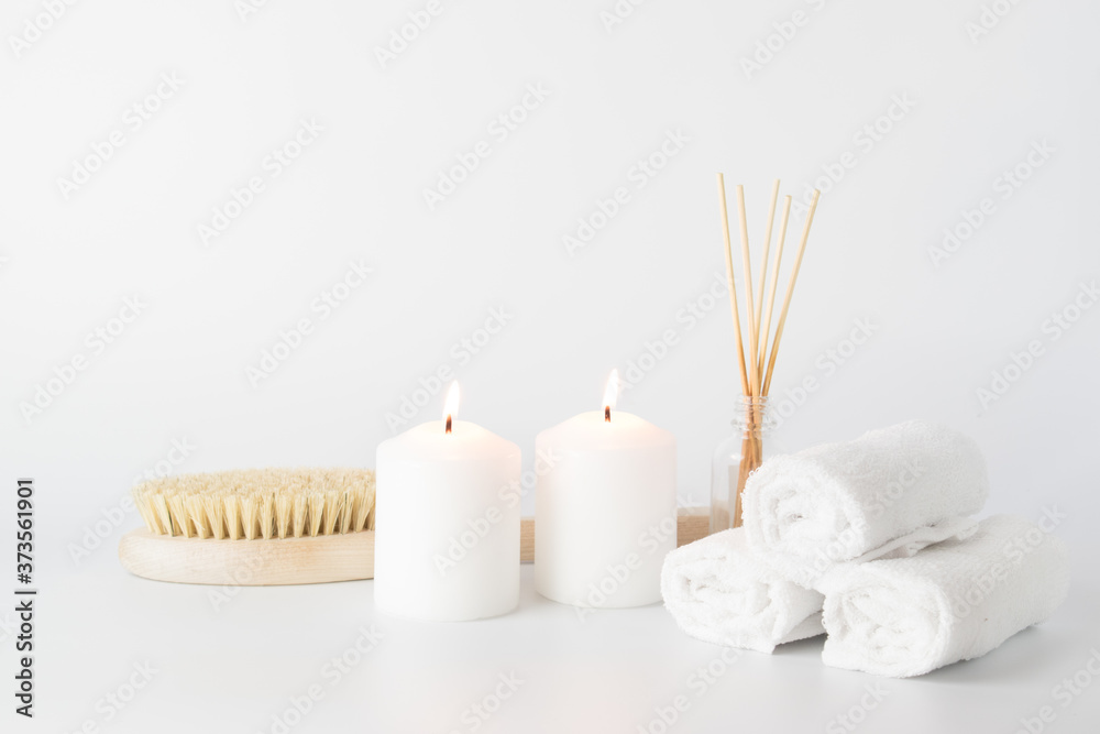 Natural body brush with bristles, candles and towels Natural body brush with bristles, candles and towels