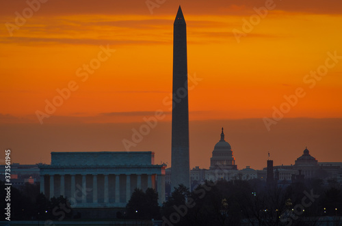 Washington DC skyline at sunrise including Lincoln Memorial, Washington Monument, and United States Capitol building - Washington D.C. United States of America