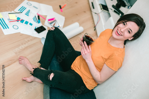 Relaxed lady with coffee at home on soft pillow © shevchukandrey