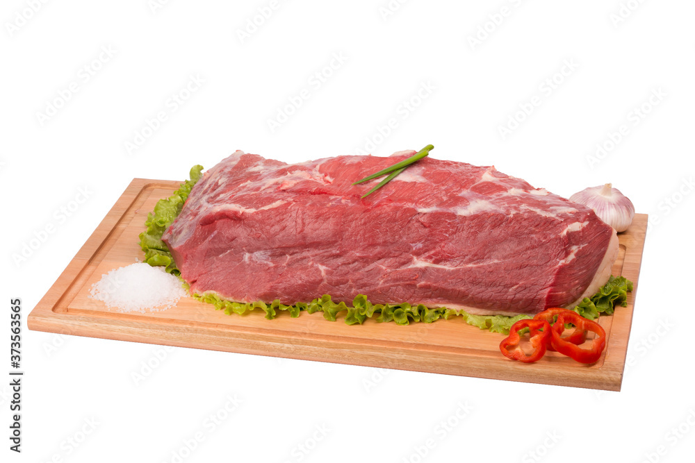 fresh and raw beef on cutting board on white background