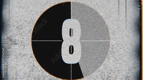 Negative film leader. Counter from 10 to 0. Old film flicker effect with signs and markers. Black vignette, color aberrations. Scratched filmstrip. Retro reel. Retro noise, grain, artifacts 4K texture