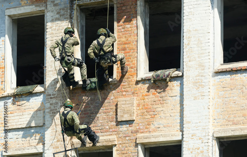 Special forces soldiers storm the walls