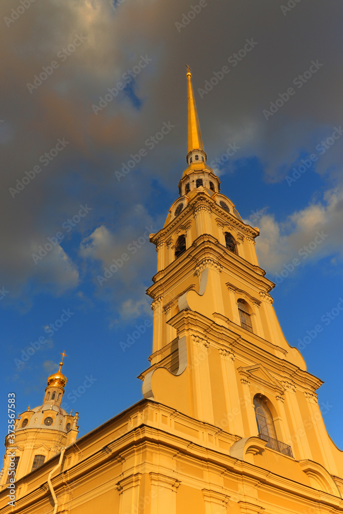 Russia, Saint Petersburg, old photo of the Peter and Paul Cathedral in the sunset with a view from below