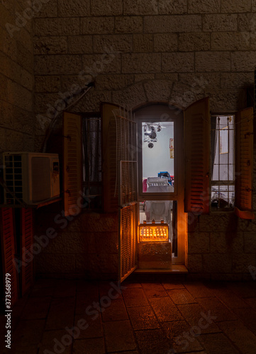 Chanuka lights on old jerusalem city street