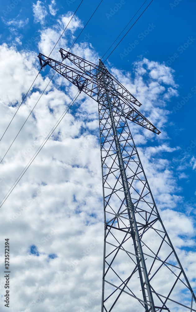 Transmission tower on the background of the sky with clouds Transmission tower on the background of the sky with clouds