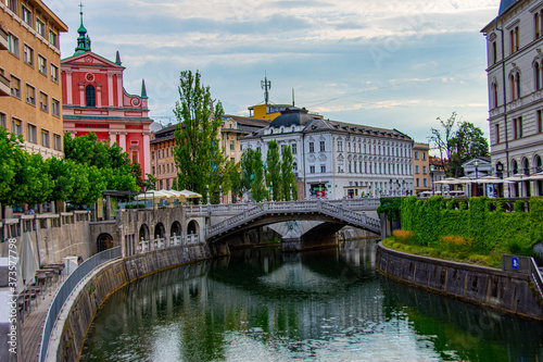 View to the bridge ove the river Ljubljanica in city of Ljubljana in Slovenia photo