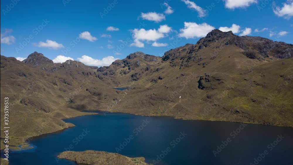 Time Lapse from a Drone flying over Andes mountains and lake in Parque Nacional Cajas, Ecuador Time Lapse from a Drone flying over Andes mountains and lake in Parque Nacional Cajas, Ecuador