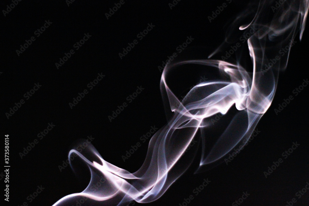 Fototapeta premium White smoke on black background