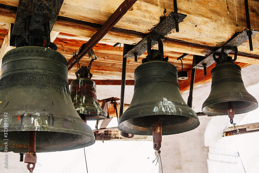 Obraz premium Old bells on church tower. Religious symbol