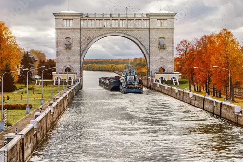 View of the shipping channel on the river, the ship enters the gateway. photo