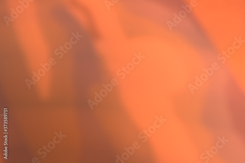 Intentionally blurred abstract image in deep shades of yellow.