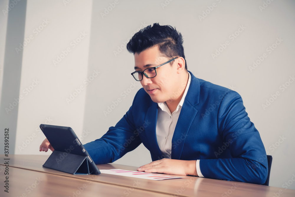 businessman working with tablet in seminar room businessman working with tablet in seminar room