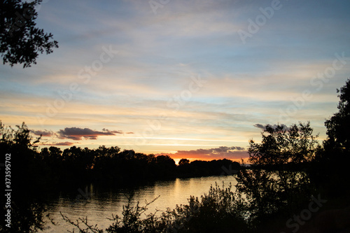 Sunset along a river  © Josh