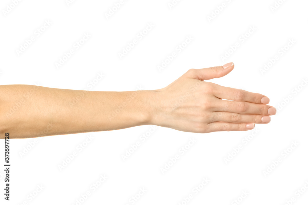 Giving hand for handshake. Woman hand gesturing isolated on white