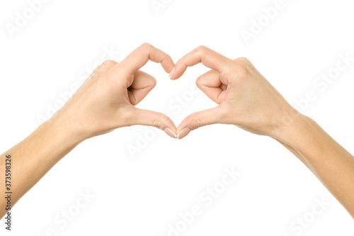 Heart shape. Woman hand with gesturing isolated on white