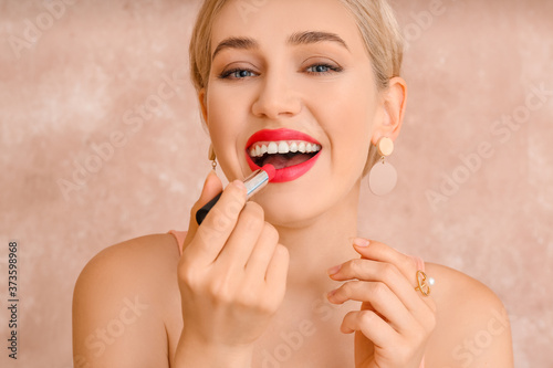 Beautiful young woman with ...
