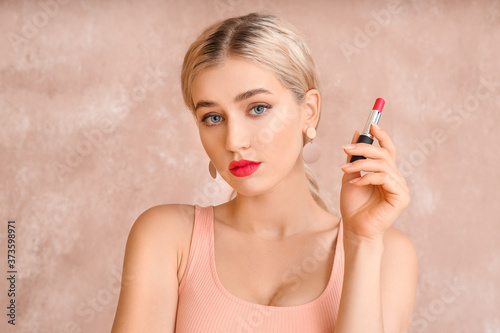 Beautiful young woman with ...