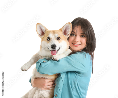 Woman with cute corgi dog on white background