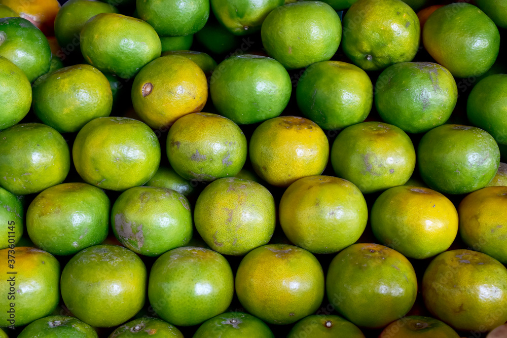 Closeup of Fresh ripe oranges for sale on a market in Thailand. Closeup of Fresh ripe oranges for sale on a market in Thailand.