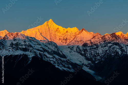 Kawagarbo at sunrise, the highest peak of the sacred snow mountain Meili in Yunnan, China