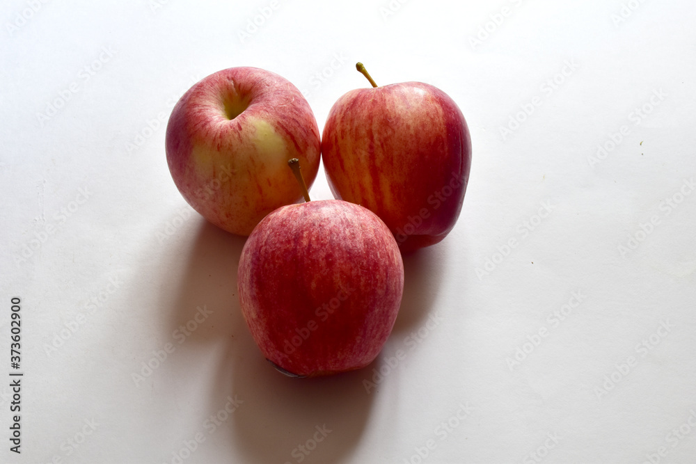 Fresh Red Apples isolated on white background and pattern selective focus and shallow depth of field. Fresh Red Apples isolated on white background and pattern selective focus and shallow depth of field.