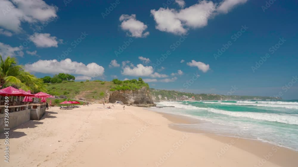 Dreamland beach one of the most beautiful sand beach Bali as well as a popular surfing spot among active lifestyle travel tourist. Bali, Indonesia 4K Dreamland beach one of the most beautiful sand beach Bali as well as a popular surfing spot among active lifestyle travel tourist. Bali, Indonesia 4K