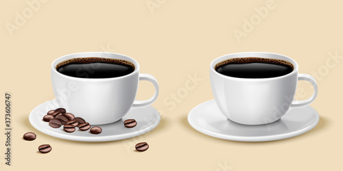 Two cups of black coffee with beans