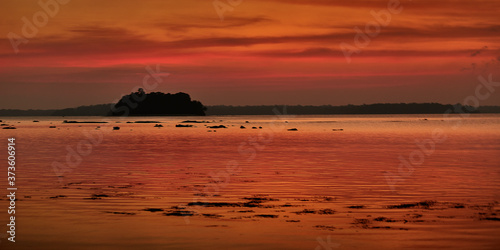 Look at the lovely tinge of blood red colour captured at a beach during sunset, how serene and beautiful are these couloirs that Mother Nature has bestowed upon all of us.