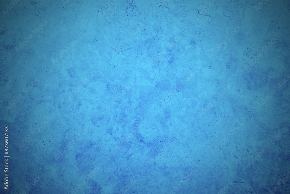 abstract blue background texture vintage, Old blue smooth plaster wall with crack for background, Old blue wall, vignette, slightly brighten the center of the image for filling letters.
