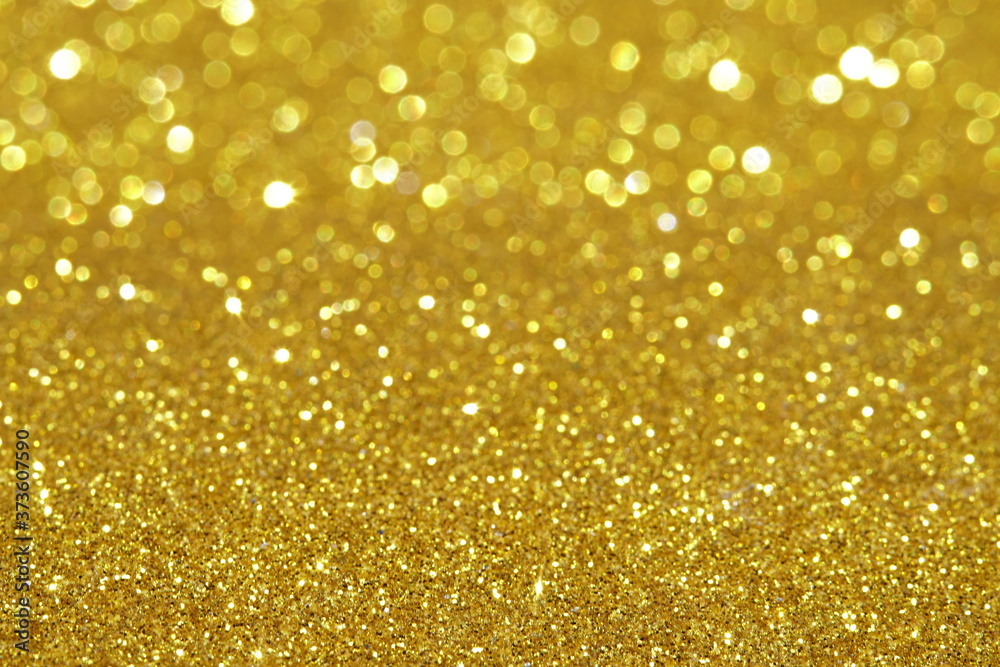 gold Sparkling Lights Festive background with texture. Abstract Christmas twinkled bright bokeh defocused and Falling stars. Winter Card or invitation gold Sparkling Lights Festive background with texture. Abstract Christmas twinkled bright bokeh defocused and Falling stars. Winter Card or invitation