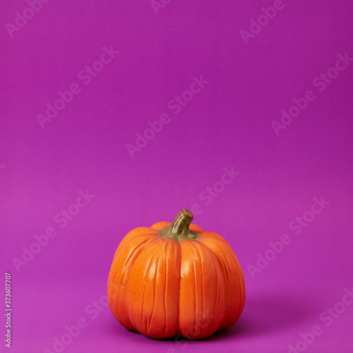 Happy halloween decorations on purple background