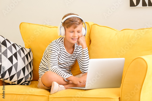 Little boy with laptop list...