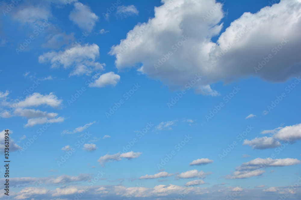 Blue Sky With Scattered Clouds With A Sun Blue Sky With Scattered Clouds With A Sun