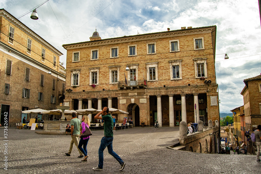 15/09/13, Urbino, Italy - People walking across a square in Urbino