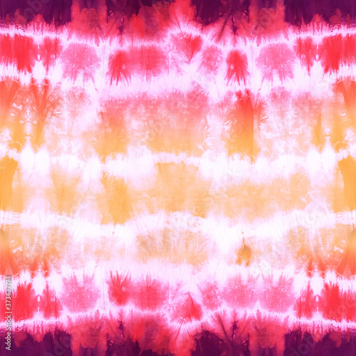 Foto Quality genuine tie dye repeat pattern with fading stripes in muted hues of purple, pink, red orange and yellow