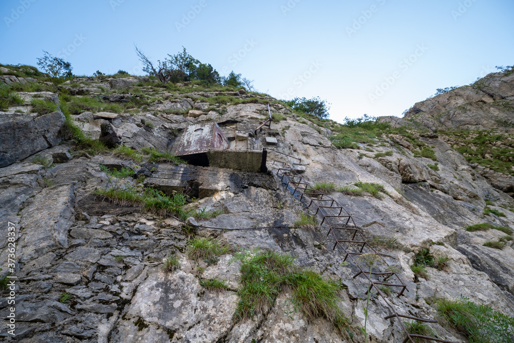 dug-in guard post set in the rock at Passo di Monte Croce near Pal Piccolo, site of trenches and battles between the Italian and Austrian armies in the World War 1. Carnic Alps, Italy