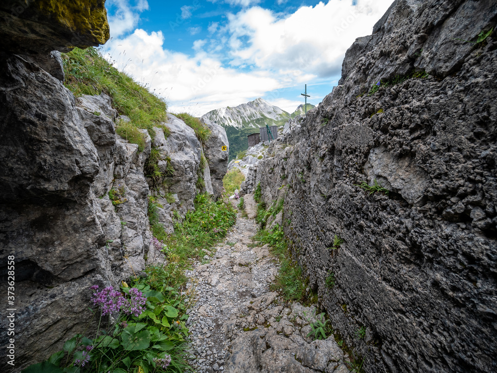 trench on Carnic Alps, site of battles between the Italian and Austrian armies in the World War 1. Passo di Monte Croce, Pal Piccolo, state border between Austria and Italy