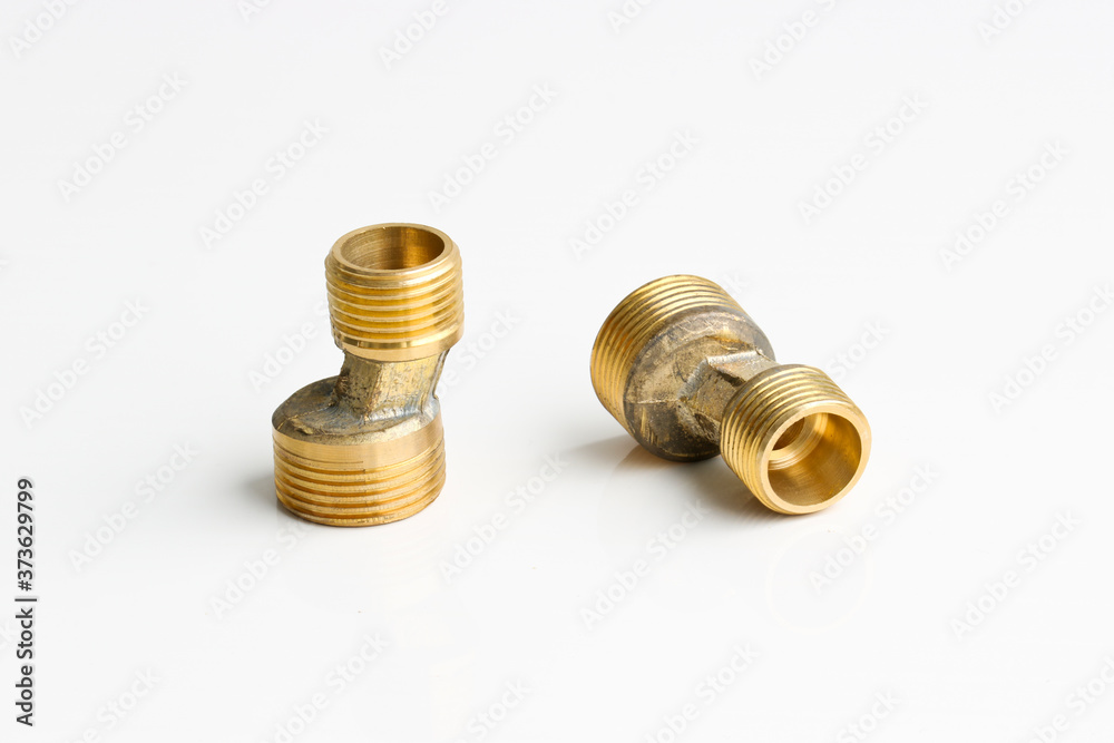 Metal brass water pipe fittings. Materials for plumbing works. Metal brass water pipe fittings. Materials for plumbing works.