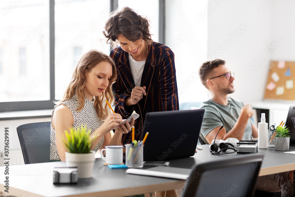 Fototapeta premium business, people and corporate concept - team of startuppers working at office
