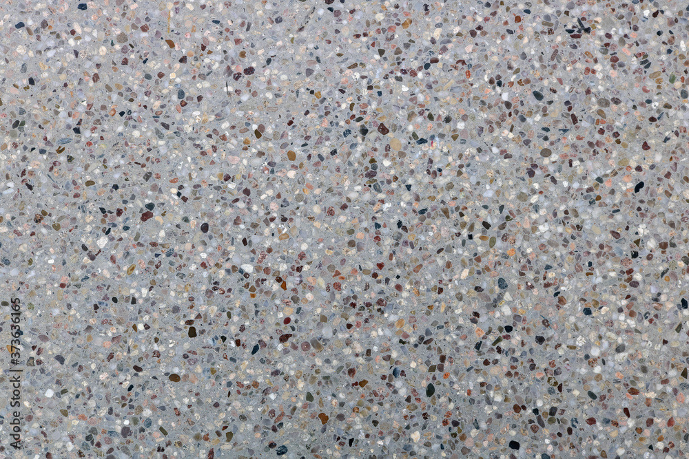 Polished concrete with small gravel texture Polished concrete with small gravel texture