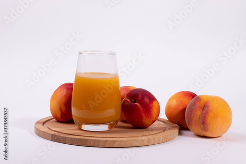a glass of peach juice