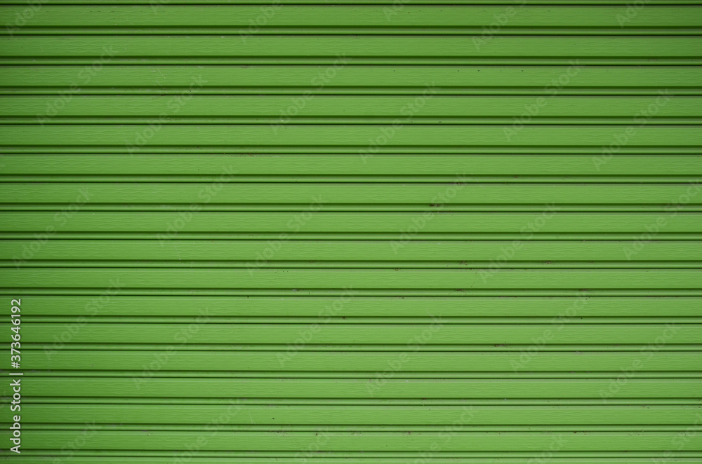 Fresh soft green lines and bars of folded door leaf texture Fresh soft green lines and bars of folded door leaf texture