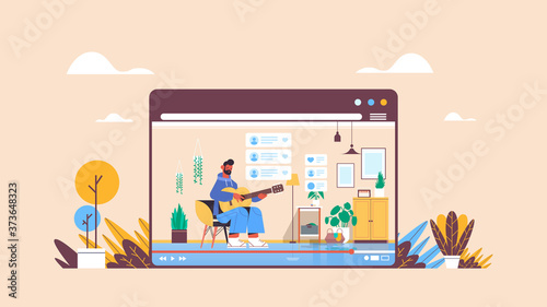 man blogger playing guitar recording online video blog live streaming blogging concept guy vlogger in web browser window living room interior horizontal full length vector illustration