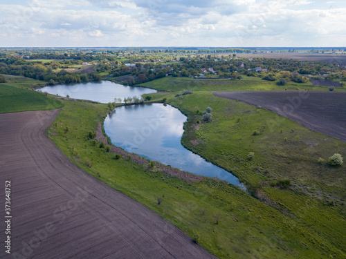 Aerial drone view. Country lake in Ukraine. © Sergey