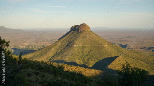 Valley of Desolation Rock Formations and hills during sunset near Graaff Reinet in South Africa.