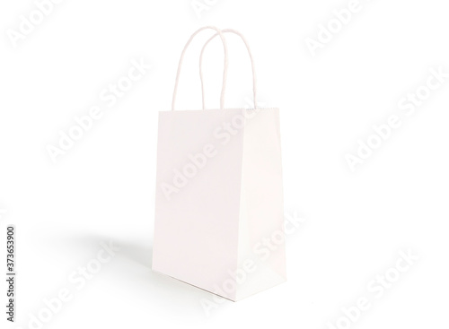 White paper shopping bag on white background.