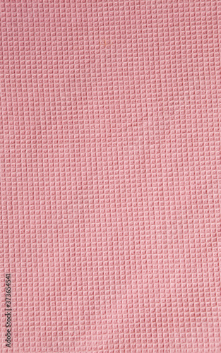 Pink tablecloth fabric texture background. Top view