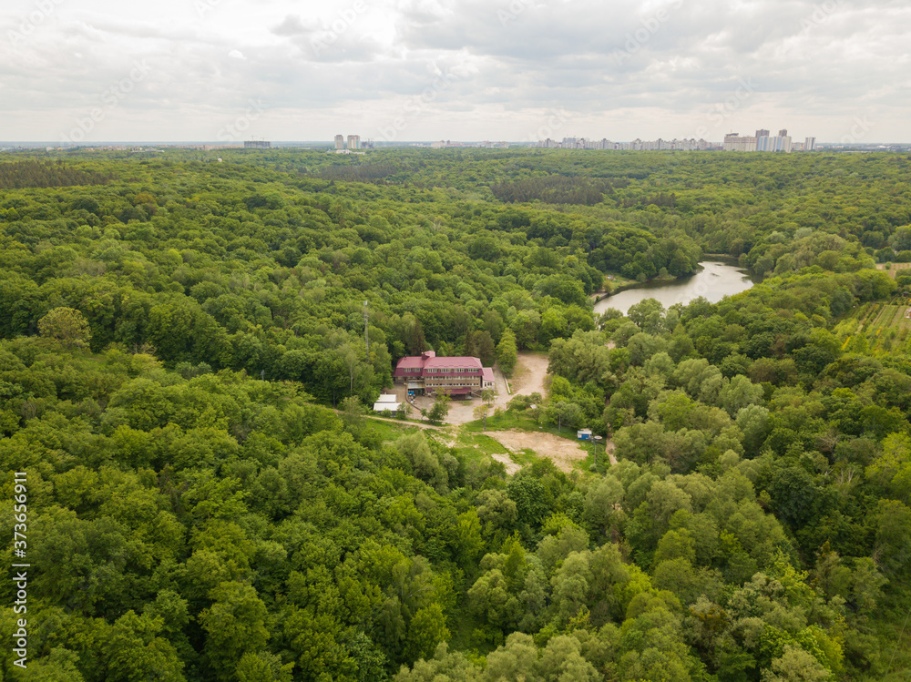 Aerial drone view. Buildings in the forest in Kiev. Aerial drone view. Buildings in the forest in Kiev.